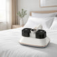 8000Pa Wireless Smart Mite Vacuum on a bed
