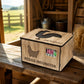 9 egg wooden incubator on a farm bench