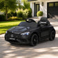 Kids electric ride on Mercedes-Benz AMG car on a driveway