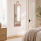 Foldable full length wall mirror in a bright bedroom