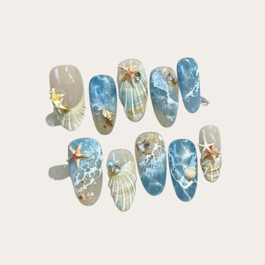 Blue seaside decorated false nails