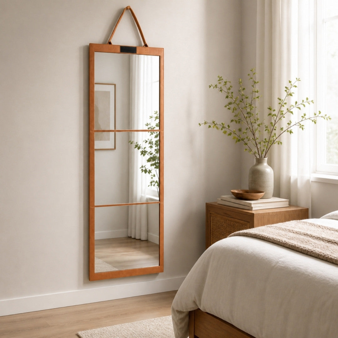 Foldable full length wall mirror in a bright bedroom