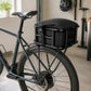 Universal black bike rear rack fitted to a bicycle
