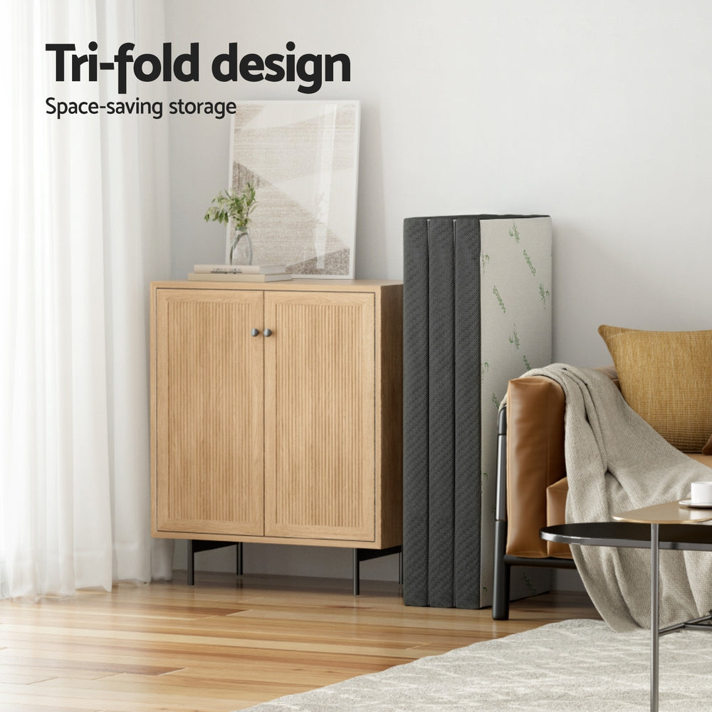 Wooden cabinet with a tri-fold design in a living room setting