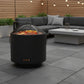 Black metal fire pit with mesh screen on a white background