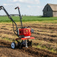 Red and black tiller on a white background