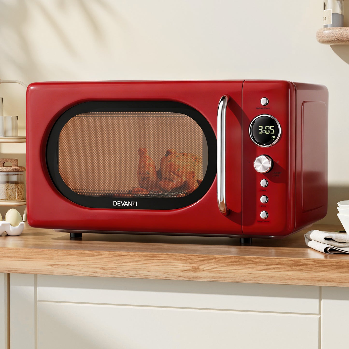 Red Devanti microwave oven on a kitchen counter