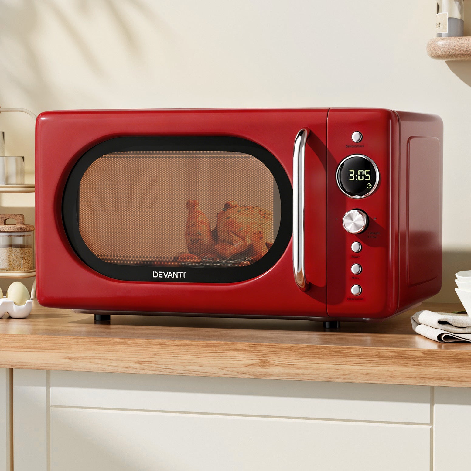 Red Devanti microwave oven on a kitchen counter