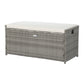 Gray wicker storage bench with a white cushion on a white background