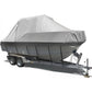 Boat on a trailer with a gray cover against a white background