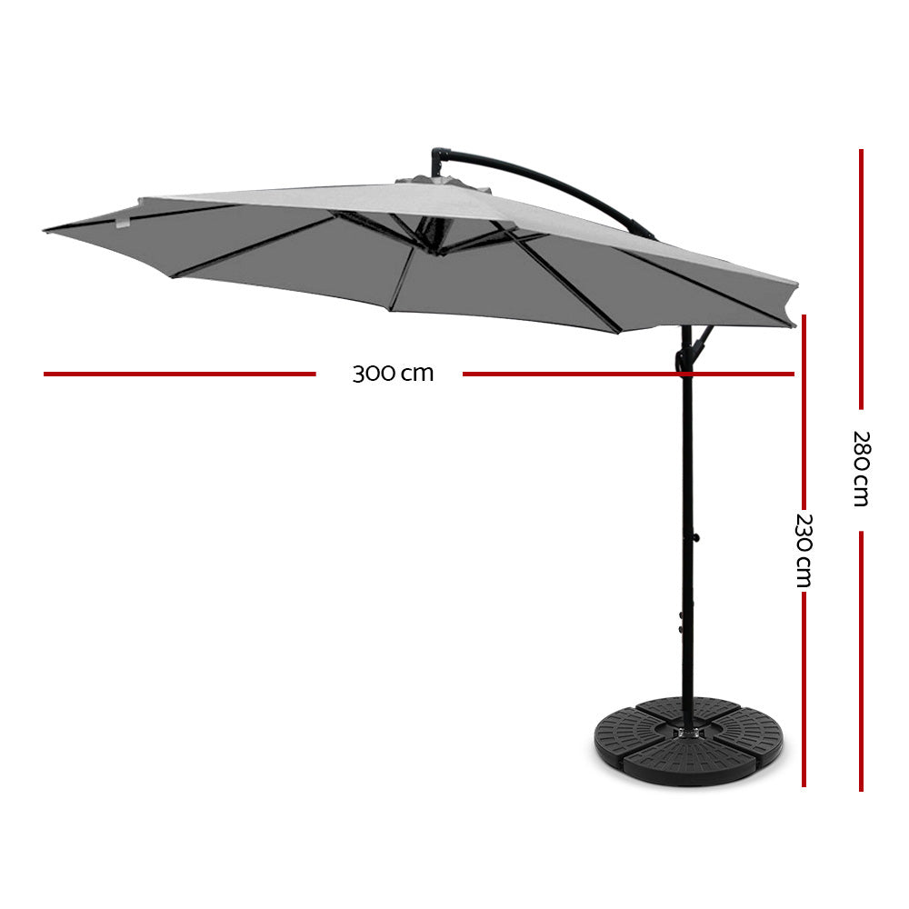 Gray patio umbrella with measurements on a white background