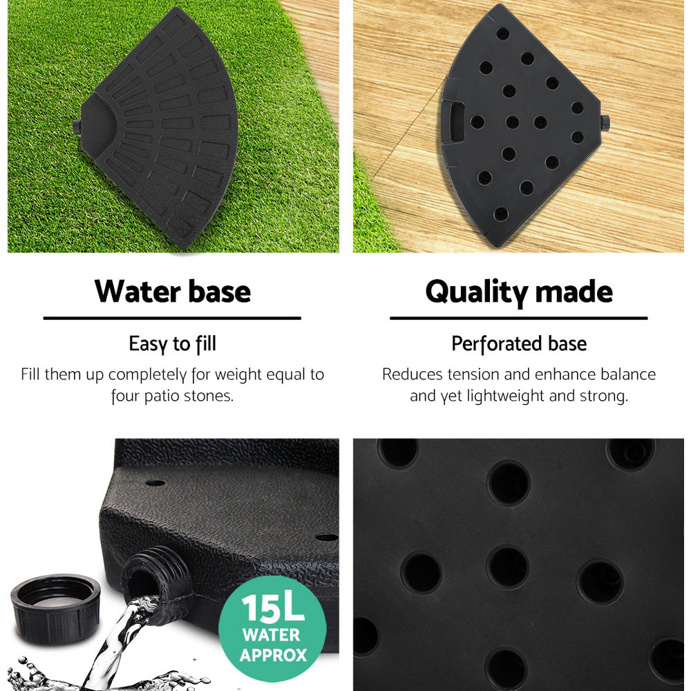 Black water base product with text on water capacity and features, shown on grass and wood.