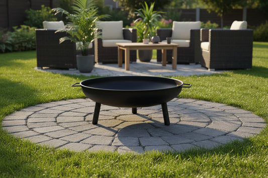Black fire pit with legs on a white background