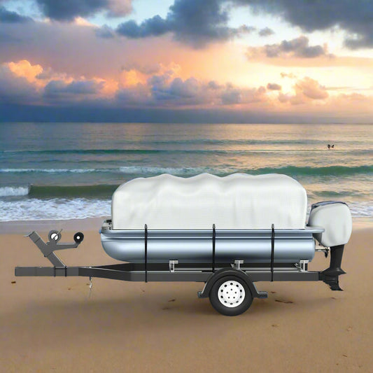 Boat on a trailer covered with a white blanket in a snowy landscape