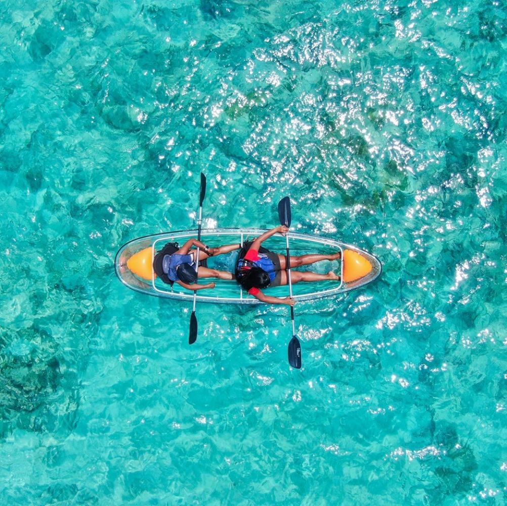 Clear Kayak with Random Colour Paddles